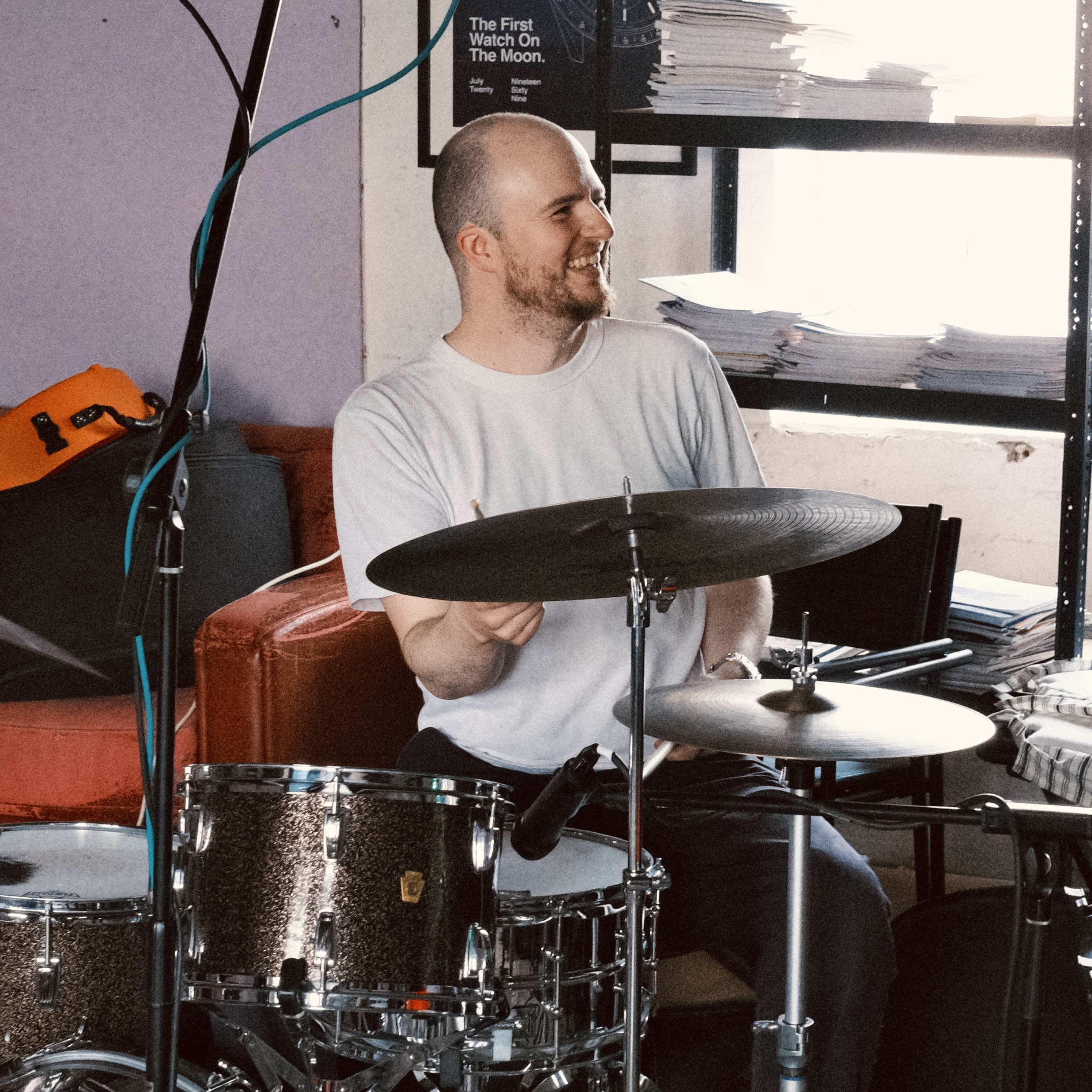 Josh Savage playing drums in the studio